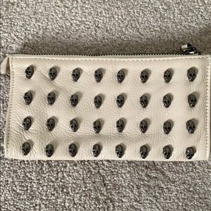 Thomas Wylde wristlet wallet in off white colour.
